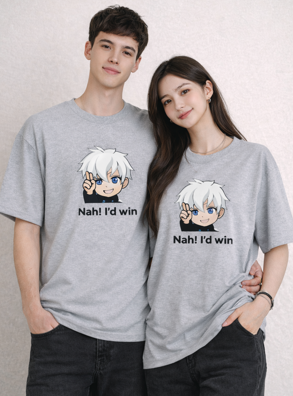 Two people wearing matching gray t-shirts with character and text.