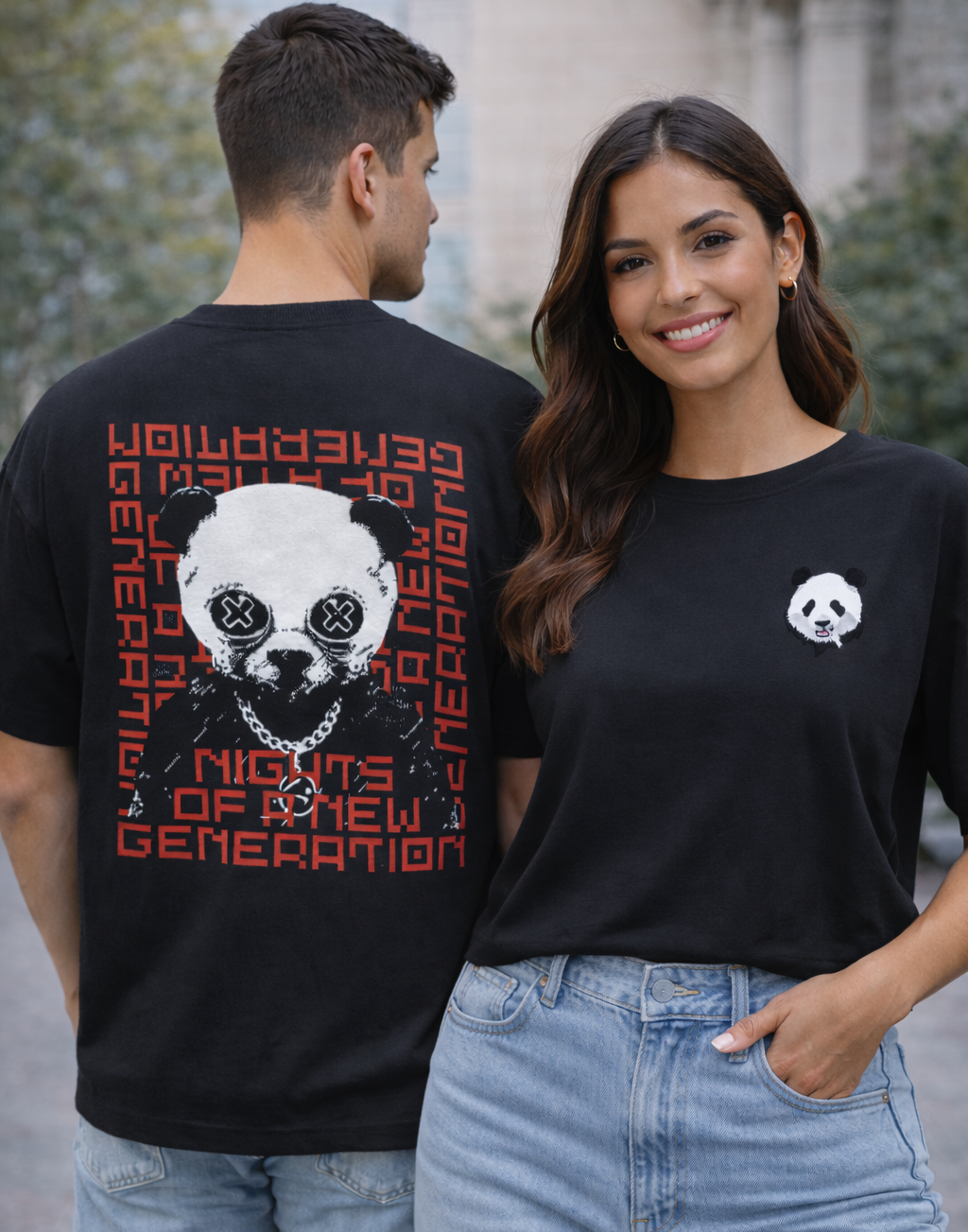 Two people wearing black t-shirts with panda designs outdoors.